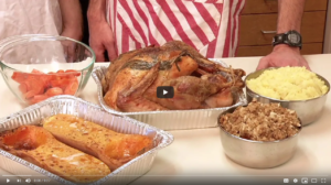 still image from the Homegrown video showing cooked turkey, squash, mashed potatoes and stuffing
