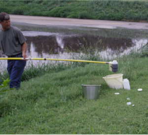 Collecting lagoon sample